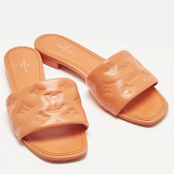 Orange Monogram Embossed Leather Revival Flat Slides